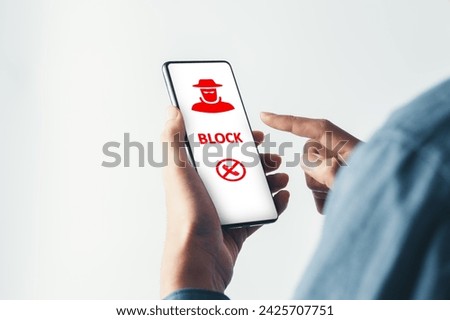 Businessman block spam or scam. emergency system hacked alert. scam and cyber security concept. Royalty-Free Stock Photo #2425707751