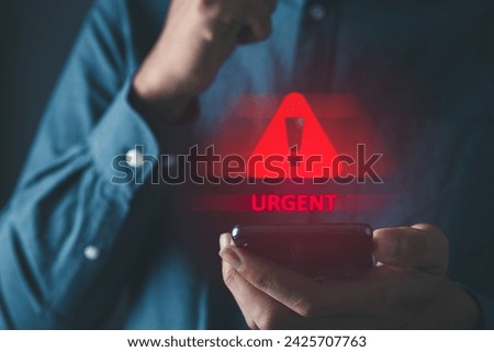 Man got urgent alert. emergency and urgent from working calling. Royalty-Free Stock Photo #2425707763