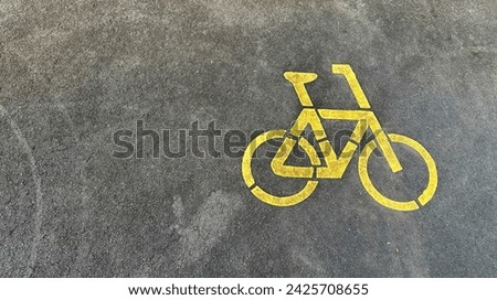 Right icon of the bicycle parking area within the serene confines of the park, providing a convenient and secure spot for cyclists to stow their bikes while exploring the natural beauty around them.