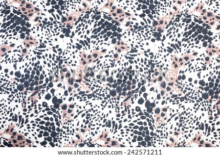 Background of black spotted animal fur print Royalty-Free Stock Photo #242571211