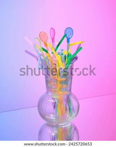 Colorful cocktail straws. Idea of fun holiday. Festive and colorful mood.