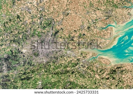 The Many Hues of London. While a typical digital camera takes one picture of a scene based on information from the visible spectrum, Landsat. Elements of this image furnished by NASA.