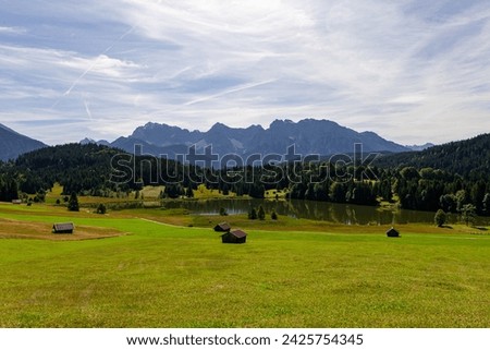 High Alps with Geroldsee and small huts in Bavarian Alps, Germany Royalty-Free Stock Photo #2425754345