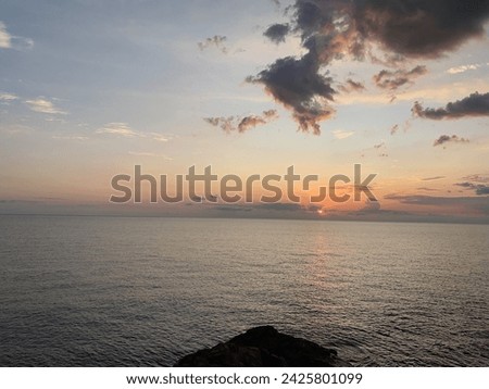Sunrise at Archer Point outside of Cooktown in Far North Queensland, Australia. Exposed Rock Ledge for fishing on the Great Barrier Reef. Landscape in nature Royalty-Free Stock Photo #2425801099