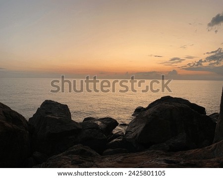 Sunrise at Archer Point outside of Cooktown in Far North Queensland, Australia. Exposed Rock Ledge for fishing on the Great Barrier Reef. Landscape in nature Royalty-Free Stock Photo #2425801105