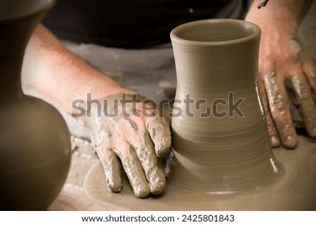 The pottery industry crafts functional and decorative items from clay, employing traditional techniques or modern innovations to create diverse wares.



 Royalty-Free Stock Photo #2425801843