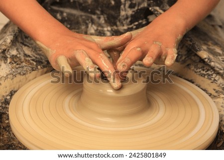 The pottery industry crafts functional and decorative items from clay, employing traditional techniques or modern innovations to create diverse wares.



 Royalty-Free Stock Photo #2425801849