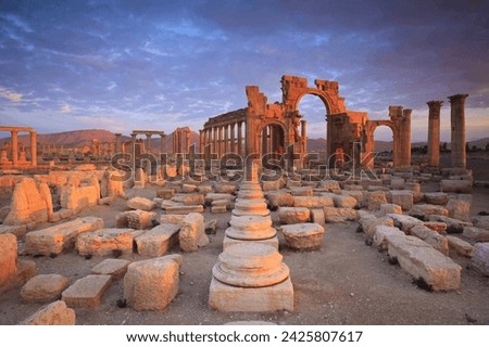 The Bel Temple in Palmyra, Syria, is an ancient architectural marvel. Majestic columns and intricate carvings adorn its facade, reflecting a blend of Roman and Semitic influences. The temple, dedicate Royalty-Free Stock Photo #2425807617