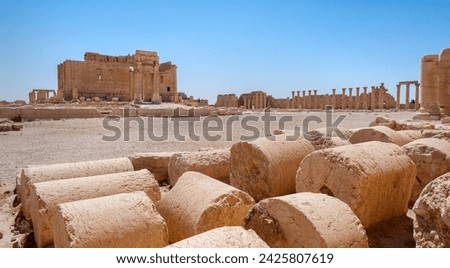 The Bel Temple in Palmyra, Syria, is an ancient architectural marvel. Majestic columns and intricate carvings adorn its facade, reflecting a blend of Roman and Semitic influences. The temple, dedicate Royalty-Free Stock Photo #2425807619