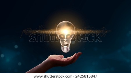 Hand holding light bulbs abstract with connected network lines 