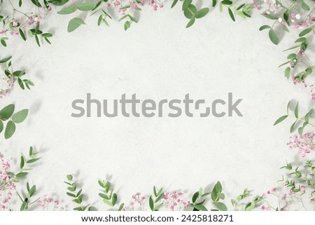 Frame made of spring flowers, flat lay copy space