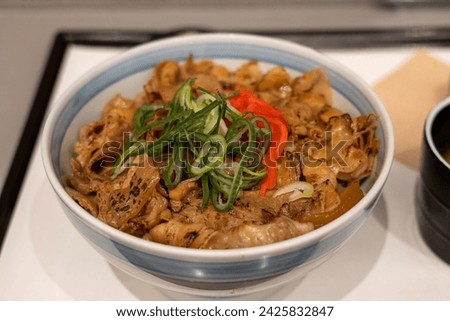 Delicious pork bowl at the Hyundai department store in Seoul. Royalty-Free Stock Photo #2425832847