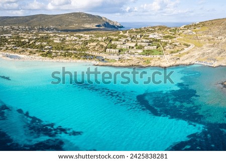 Aerial view of famous La Pelosa beach at sunny summer day. Stintino, Sardinia island, Italy. Royalty-Free Stock Photo #2425838281