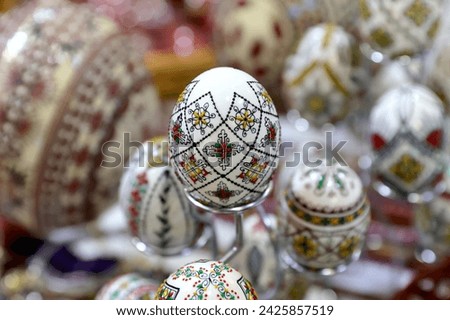Traditional hand made painted Easter eggs presented at a fair of popular traditions.The eggs are painted with traditional motifs from Bukovina.