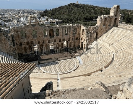 Can you imagine watching dramatic performances and listening to amazing music here, I sure could. (Theatre in Athens) Royalty-Free Stock Photo #2425882519