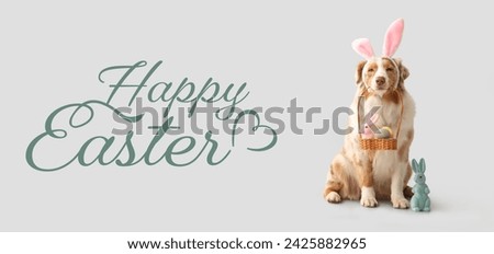 Banner with Australian Shepherd dog with Easter basket of eggs and toy rabbit on light background