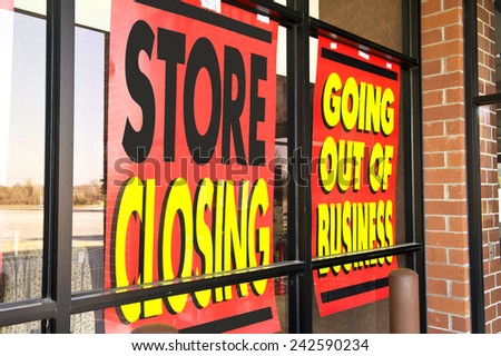 Horizontal Shot Of Signs Of The Recession/ Going Out Of Business