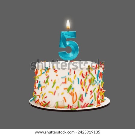 5 shaped candle light on happy birthday cake isolated on white background
