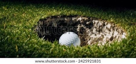 Golf Ball that finds itself in a Difficult Situation after the Shot that Every Golfer Knows Wallpaper Background Brainstorming Family Digital Art Magazine Poster Symbolimage Royalty-Free Stock Photo #2425921831