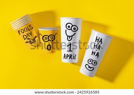 April Fools' Day celebrated on April 1 concept, background with Paper cup for prank