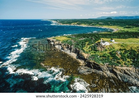 Aerial image of Lobster Cove Head Lighthouse, Newfoundland, Canada