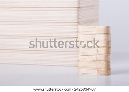 Wooden flash drives and photo box for photo storage on wooden white background. Stack of boxes on white. set for the photographer, presentable set of photos, luxury feedback to client. Royalty-Free Stock Photo #2425934907