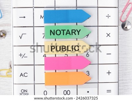 NOTARY PUBLIC is written on arrow-shaped stickers