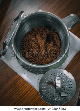 Photo of Indonesian robusta coffee in Vietnamese drip, on February 14 2024