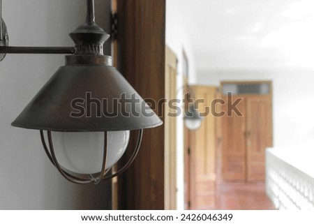 Close Up Ancient lamps attached to the walls of a Yogyakarta hotel, 2016 Royalty-Free Stock Photo #2426046349