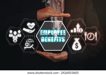 Employee Benefits Career Concept, Business person hand holding Employee Benefits icon on virtual screen. Royalty-Free Stock Photo #2426053605