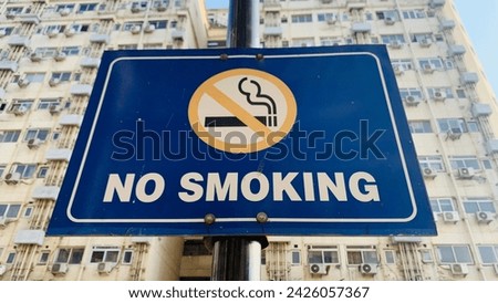 "No smoking sign on a clean, white background. Clear and concise prohibition message. Ideal for promoting smoke-free zones and conveying a healthy lifestyle. Copy space available