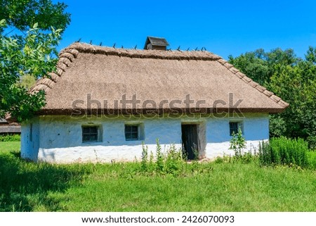 Ancient traditional ukrainian rural house in Pyrohiv (Pirogovo) village near Kiev, Ukraine Royalty-Free Stock Photo #2426070093