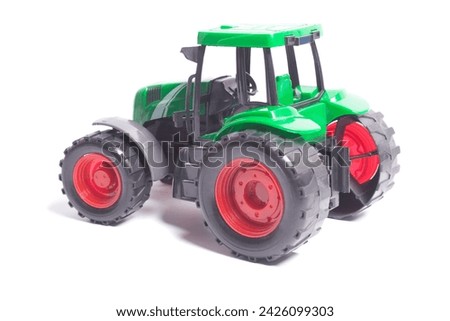 radio-controlled tractor toy isolated on white background.