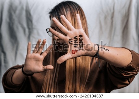 Women in fear of violence. Enough! 8th March, International Women Day. Vulnerable women yearning for freedom without abuse. Not one woman less, women demanding equality. Royalty-Free Stock Photo #2426104387