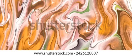 Abstract fluid art background yellow and white colors. Liquid marble. Acrylic painting on canvas with orange lines and gradient. Alcohol ink backdrop with beige wavy pattern.