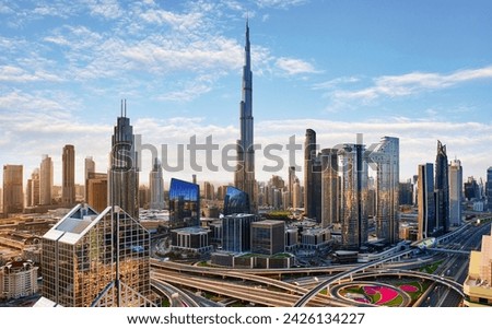 Dubai skyline at sunset with traffic - aerial view, United Arab Emirates Royalty-Free Stock Photo #2426134227