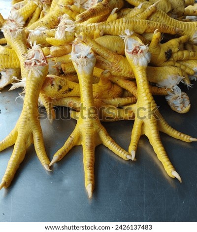 I went to the market and I saw chicken feet and took a picture