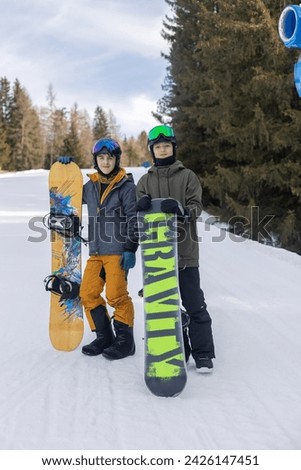 Children and adults, happy family in winter clothing at ski vacation, skiing, wintertime