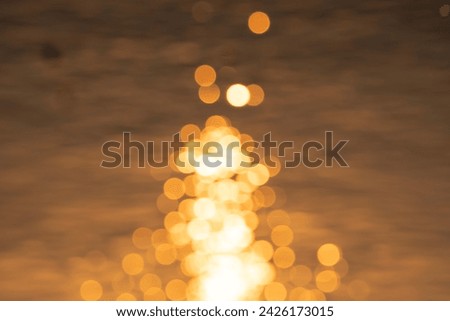 Bokeh of sun light refection with the sea blured photo,Beautyful Background,Abstract photo