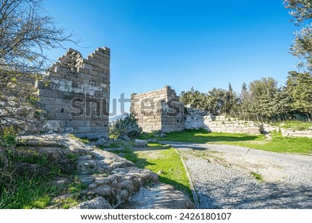 The scenic views of The Myndos Gate was built in the 4th century BC to protect the city of Halicarnassus from invaders in Bodrum. Royalty-Free Stock Photo #2426180107