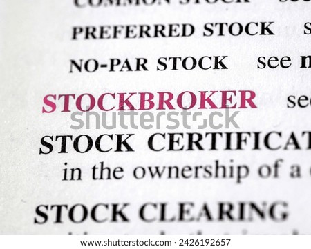 close up photo of the words stockbroker