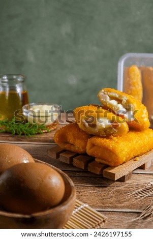  risol mayo, filled with mayonnaise, smoked beef, cheese and eggs.  savory and creamy in one Royalty-Free Stock Photo #2426197155