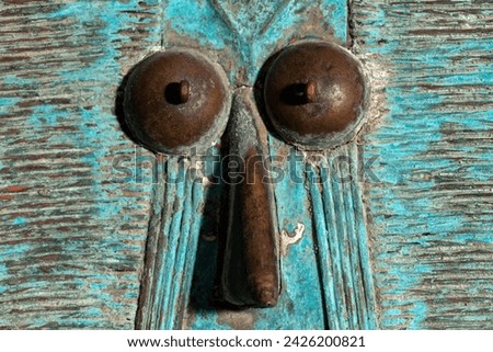 Macro shot of a wooden Kota reliquary figure from Gabon. Tribal African art, showcasing masterful craftsmanship and spiritual symbolism. Royalty-Free Stock Photo #2426200821