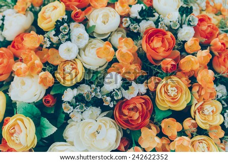 wedding bouquet with rose bush, Ranunculus asiaticus as a background