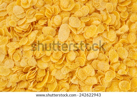 Corn-flakes background and texture, cornflake cereal box for morning breakfast. Royalty-Free Stock Photo #242622943