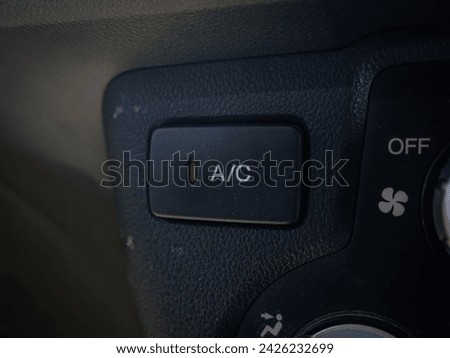 Air Conditioner button on a city car