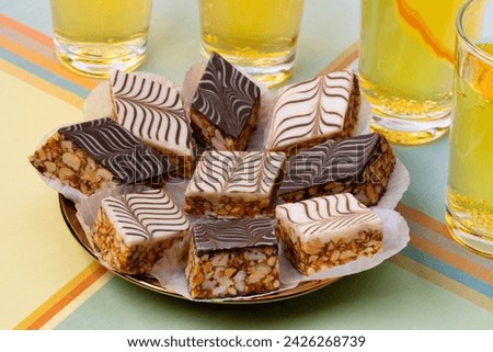 Plate with white and brown Moroccan marbled chocolate cookies close up  Royalty-Free Stock Photo #2426268739