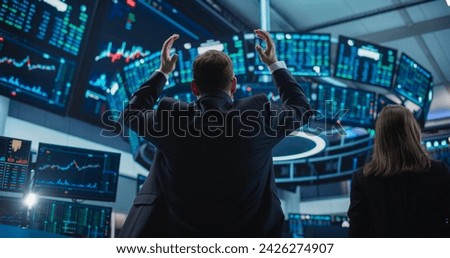 Depressed Stock Exchange Trader Stressed and Angry with Situation on Financial Market. Professional Broker Saddened by Bad News, Holding His Head in Defeated Fashion, Showing Negative Emotions Royalty-Free Stock Photo #2426274907