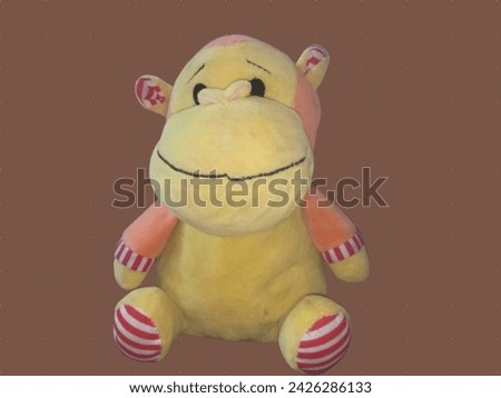 kids animal toy yellow monkey picture with plain background 