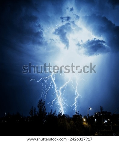 Incredible thunderstorm front. Amazing shot of a lightning strike.